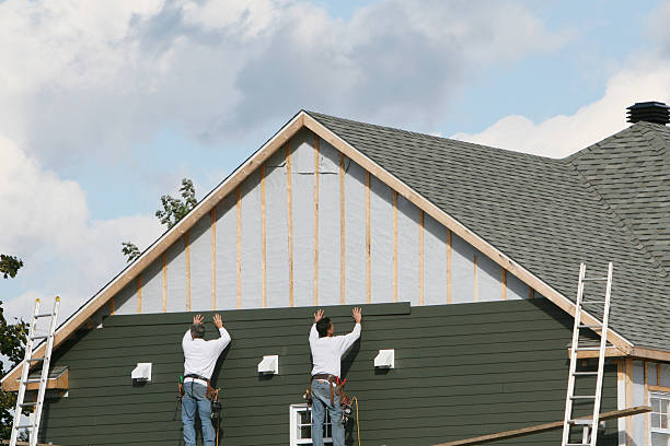 Professional Siding Replacement technician working in Bedford, MA